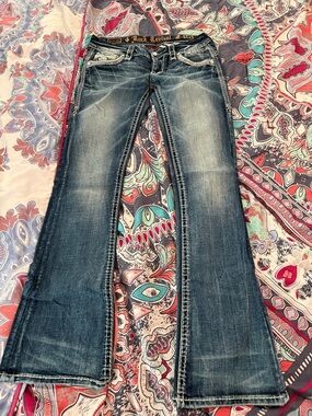 Rock Revival Women's Flared Jeans in Dark Wash with Whiskering